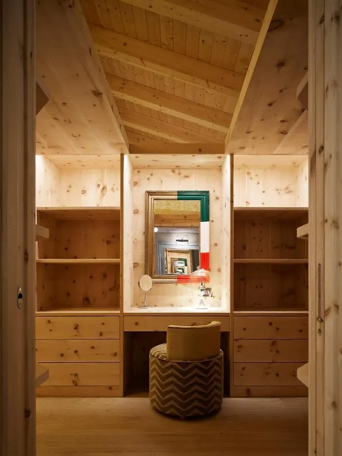 *** מלון קורטינה ד'אמפזו Dolomiti Lodge Alvera איטליה